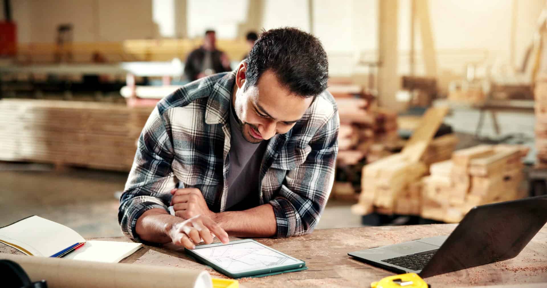 Joiner reviewing a made-to-measure design
