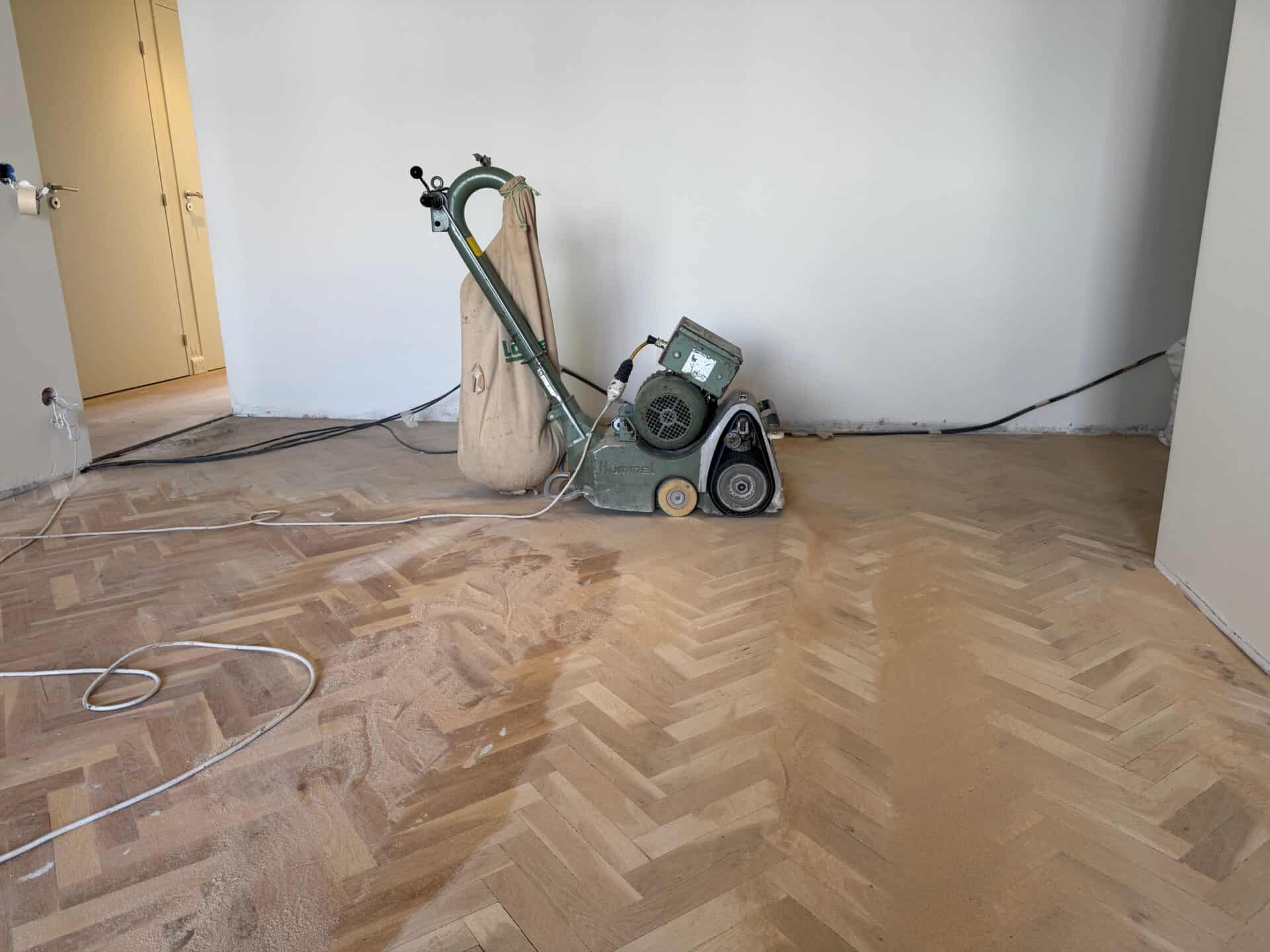 Wooden floor being restored during property refurbishment