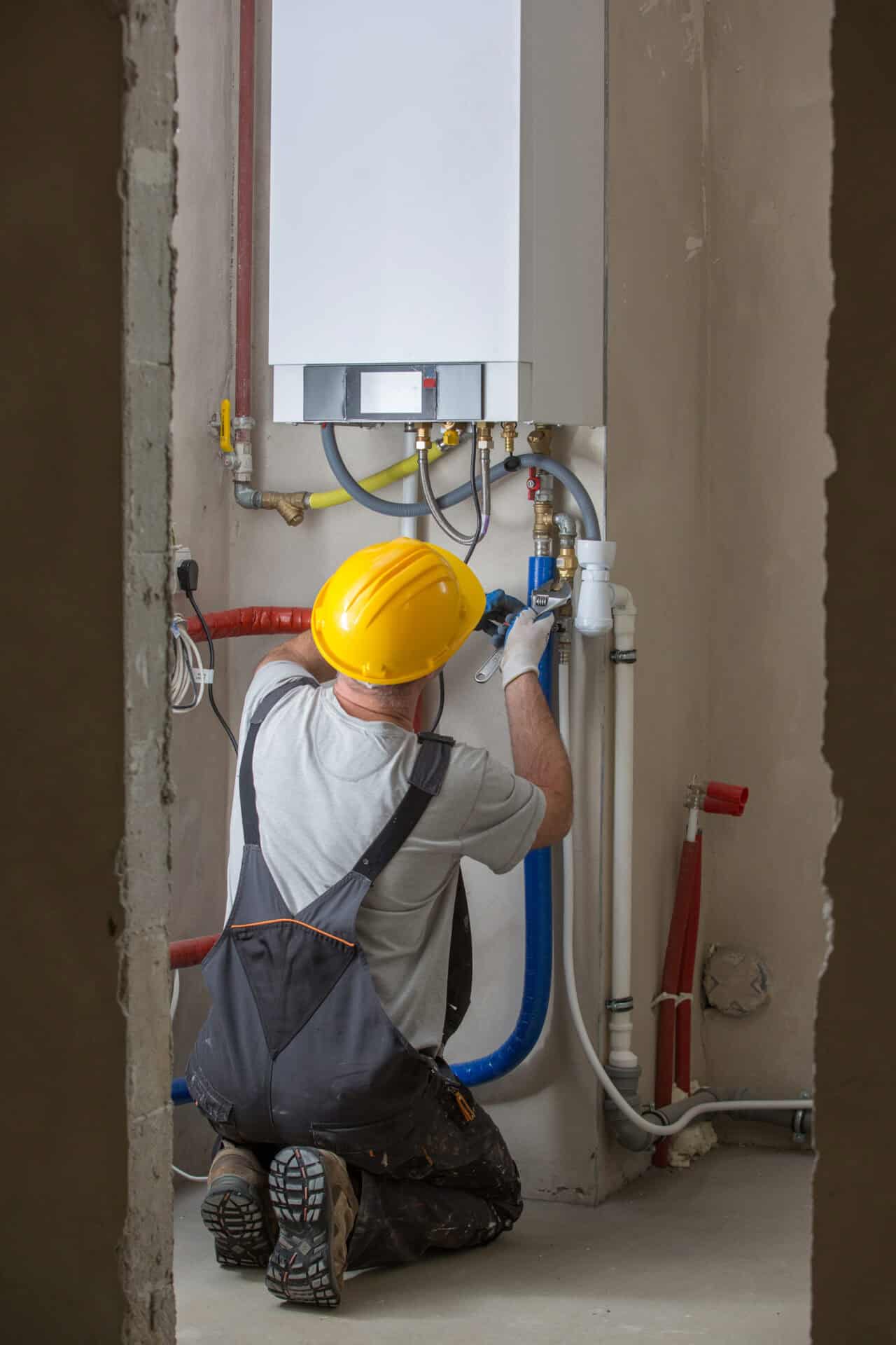 Professional plumbing work during a home renovation